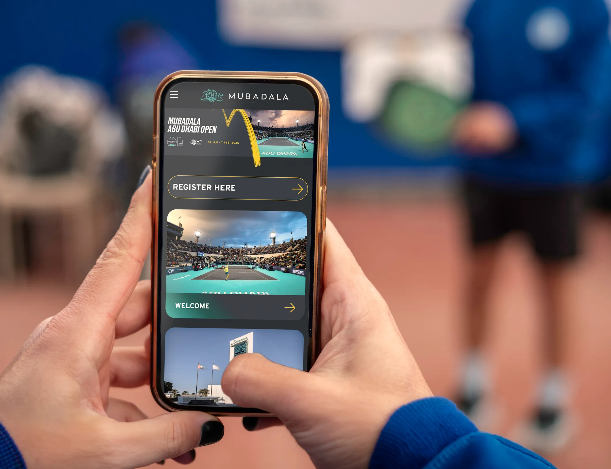 The Mubadala guest app on a phone