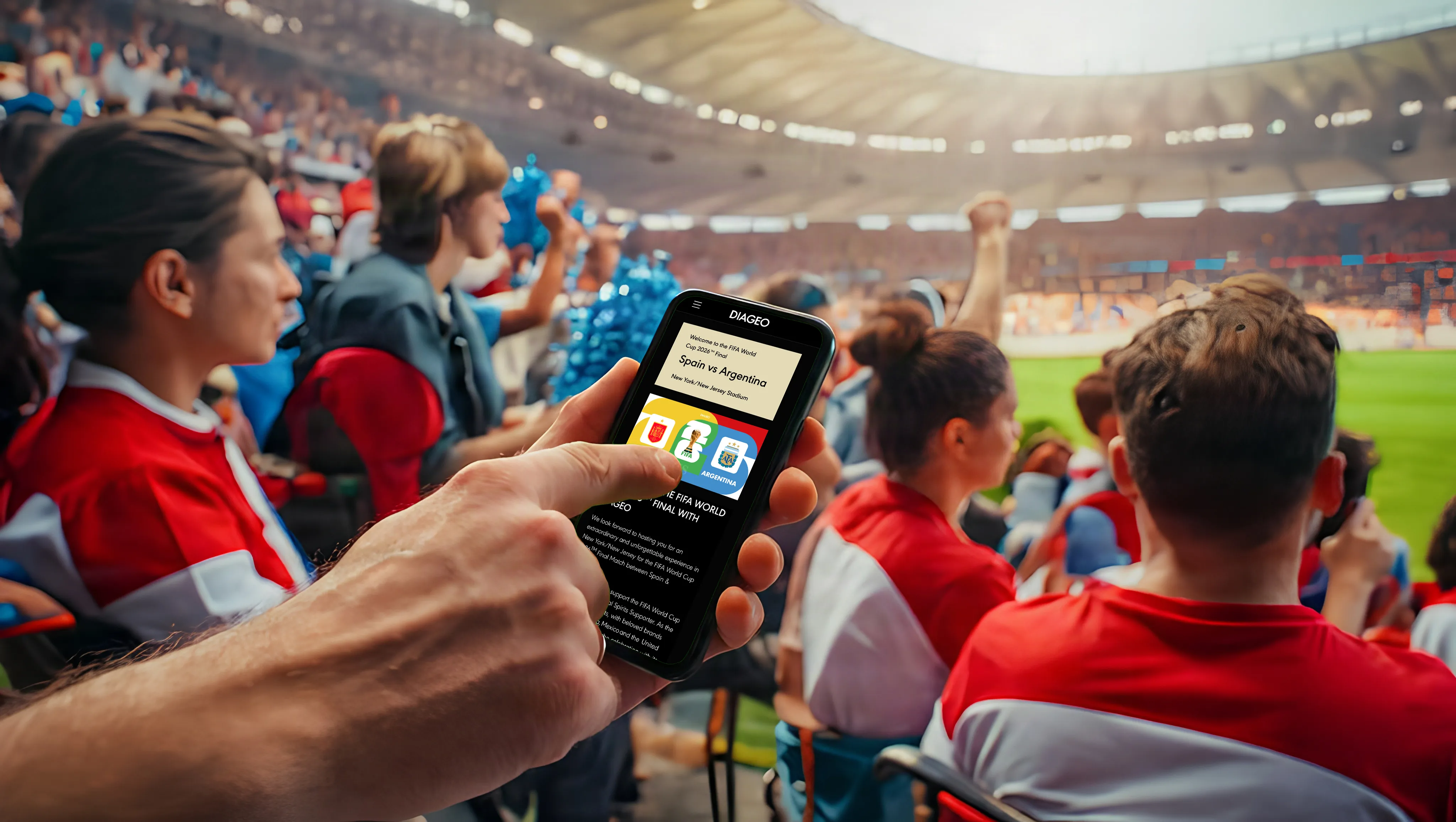 A guest using the Diageo event companion on a phone in the crowd